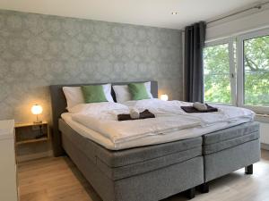 Ένα ή περισσότερα κρεβάτια σε δωμάτιο στο Tranquil Group Retreat in Nature