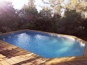 Swimming pool sa o malapit sa Villa Le Niaouli