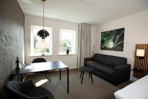 A seating area at Hotel Dalgas, BW Signature Collection