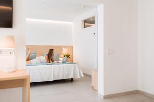 Llit o llits en una habitació de Gran Sagitario