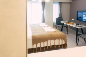 TV a/nebo společenská místnost v ubytování 谷町君 HOTEL 日本橋47