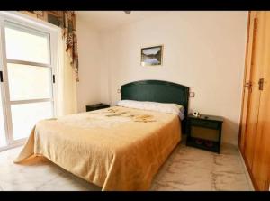 Posteľ alebo postele v izbe v ubytovaní Apartamento la isla