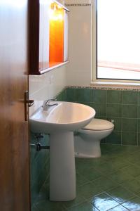 Koupelna v ubytování Residence Gioiosa Marea