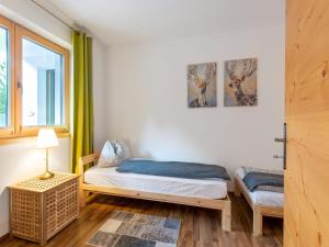 Postel nebo postele na pokoji v ubytování Apartment in Tyrol near Ski Lift