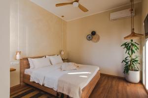 Postel nebo postele na pokoji v ubytování Living Stone Aparthotel