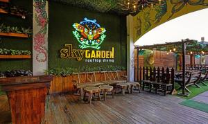 a restaurant with a sign that reads stay garden trading party at Treebo Trend De Grandeur Anand Nagar in Thane