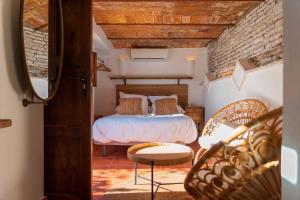 Cama o camas de una habitación en CANDIL SUITE Realejo