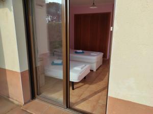 A bed or beds in a room at Villa El Mirador