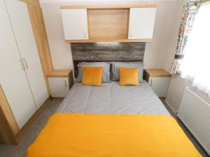 Tempat tidur dalam kamar di Castleview 22