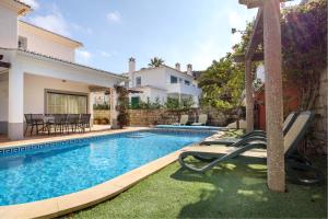 a swimming pool in the backyard of a house at Villa Goshen in Lagos