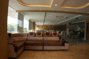 a living room with a couch in a building at HOTEL OCEAN VISTA BAY in Visakhapatnam