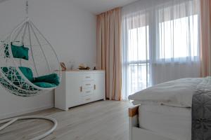 Posteľ alebo postele v izbe v ubytovaní LAWIS Apartments