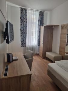 TV a/nebo společenská místnost v ubytování Hotel Perkeo
