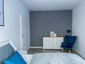 Posteľ alebo postele v izbe v ubytovaní LAWIS Apartments