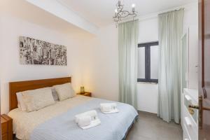 Ένα ή περισσότερα κρεβάτια σε δωμάτιο στο Miral 3 - Sea front by HD PROPERTIES