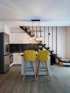 Kuchyň nebo kuchyňský kout v ubytování Freesia Loft Apartment
