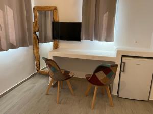 Televízia a/alebo spoločenská miestnosť v ubytovaní Chill Out Studio