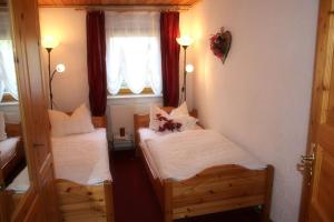 Postel nebo postele na pokoji v ubytování Kieslinger Hilde