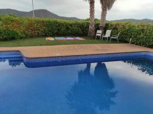 The swimming pool at or close to Villa El Mirador