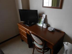 Telewizja i/lub zestaw kina domowego w obiekcie Select Inn Mishima