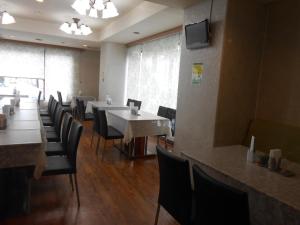 Telewizja i/lub zestaw kina domowego w obiekcie Select Inn Mishima