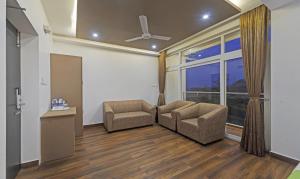 Posezení v ubytování Treebo Premium Raffis' Andalusia Bay Way