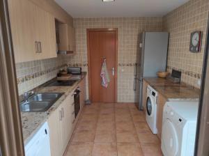 A kitchen or kitchenette at Villa El Mirador