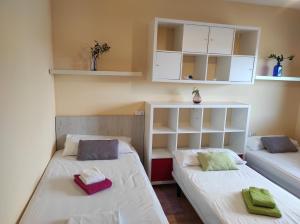 A bed or beds in a room at Villa El Mirador
