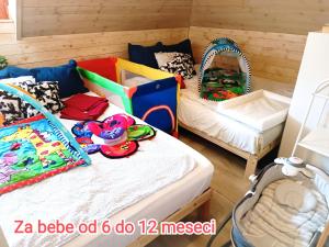 Krevet ili kreveti u jedinici u objektu Vila POGLED Wellness i spa