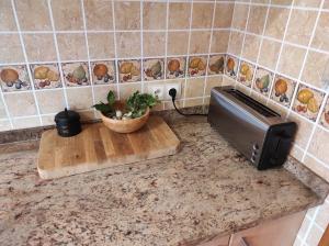 A kitchen or kitchenette at Villa El Mirador