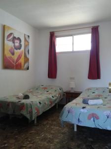 Postel nebo postele na pokoji v ubytování Carihuela Park Residence