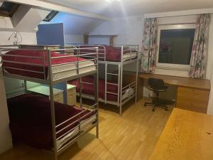 A bed or beds in a room at Suburb Hostel Még 6 kép