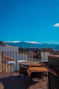 a bath tub sitting on top of a balcony at CANDIL SUITE Realejo in Granada