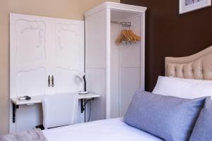 Postel nebo postele na pokoji v ubytování Hotel Gambrinus