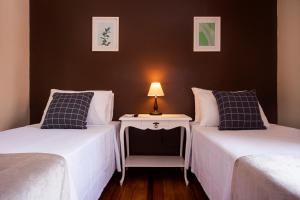 Postel nebo postele na pokoji v ubytování Hotel Gambrinus