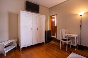 TV a/nebo společenská místnost v ubytování Hotel Gambrinus