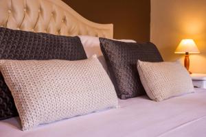 Postel nebo postele na pokoji v ubytování Hotel Gambrinus