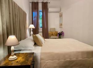 Villa Cinzia-150 mt from the beach客房内的一张或多张床位