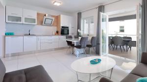 Η κουζίνα ή μικρή κουζίνα στο Apartmani "Villa Barbara"