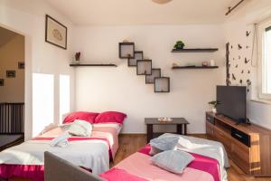 Posteľ alebo postele v izbe v ubytovaní Beach Apartment Milena
