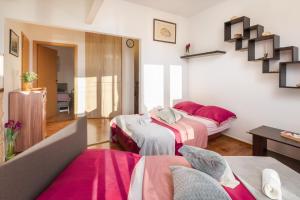 Posteľ alebo postele v izbe v ubytovaní Beach Apartment Milena