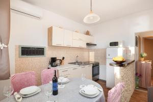 Kuchyňa alebo kuchynka v ubytovaní Beach Apartment Milena