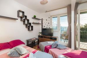 Posteľ alebo postele v izbe v ubytovaní Beach Apartment Milena