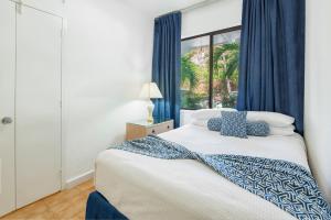 Postel nebo postele na pokoji v ubytování Belair Beach Hotel