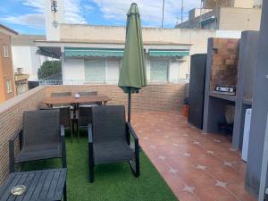 Balkón nebo terasa v ubytování Apartamento con terraza cerca del Paseo Marítimo