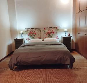 Postel nebo postele na pokoji v ubytování Klio Guesthouse