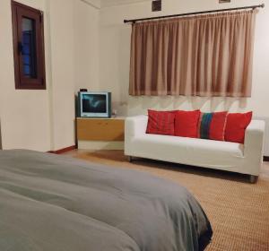 TV a/nebo společenská místnost v ubytování Klio Guesthouse