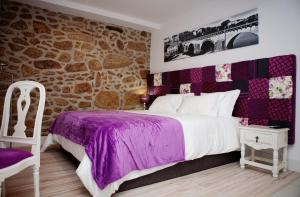Postel nebo postele na pokoji v ubytování Top'Otel