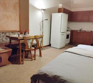 Kuchyň nebo kuchyňský kout v ubytování Klio Guesthouse