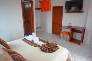 Postel nebo postele na pokoji v ubytování Arena Blanca Eco Hotel